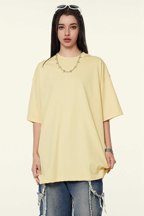 Heavyweight Cotton Relaxed Drop-Shoulder T-Shirt in Cream Apricot - front modeled view
