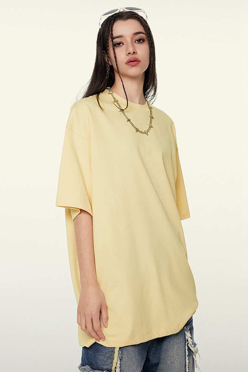 Heavyweight Cotton Relaxed Drop-Shoulder T-Shirt in Cream Apricot - front modeled view