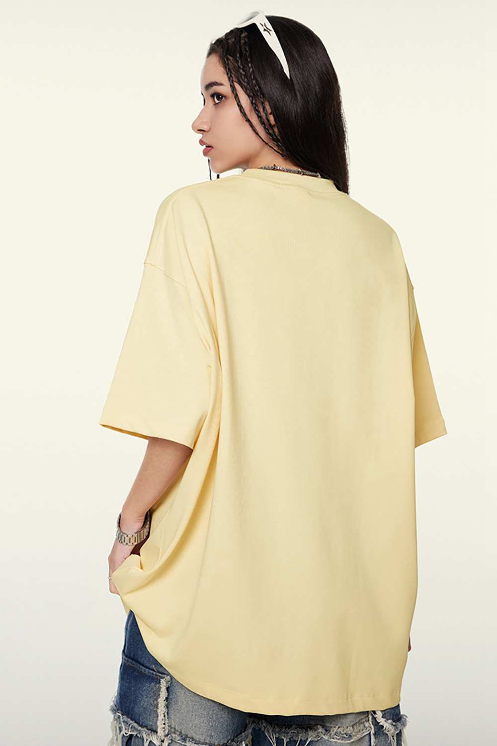 Heavyweight Cotton Relaxed Drop-Shoulder T-Shirt in Cream Apricot - back modeled view