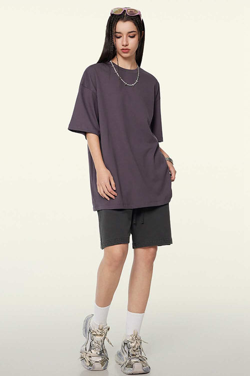 Heavyweight Cotton Relaxed Drop-Shoulder T-Shirt in Fade Purple - full-length front modeled view