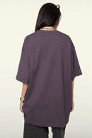 Heavyweight Cotton Relaxed Drop-Shoulder T-Shirt in Fade Purple - back modeled view