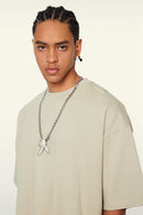 Heavyweight Cotton Relaxed Drop-Shoulder T-Shirt in Gray Apricot - front modeled view
