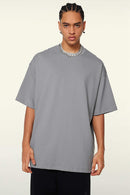 Heavyweight Cotton Relaxed Drop-Shoulder T-Shirt in Medium Gray - front modeled view