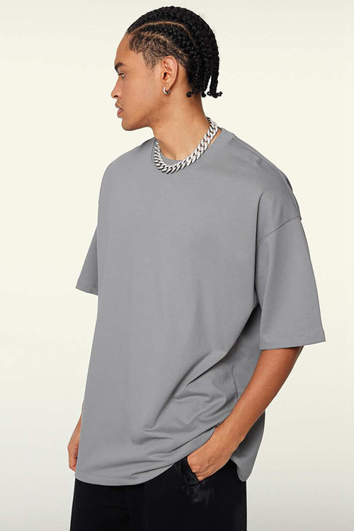 Heavyweight Cotton Relaxed Drop-Shoulder T-Shirt in Medium Gray - front modeled view
