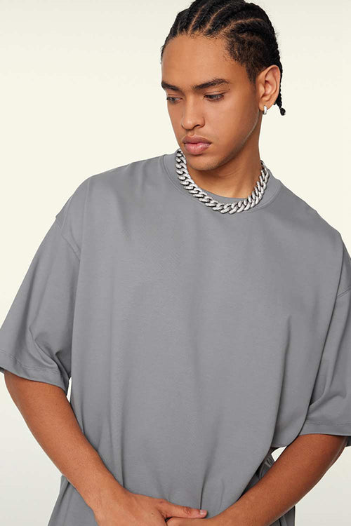 Heavyweight Cotton Relaxed Drop-Shoulder T-Shirt in Medium Gray - front modeled view