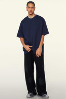 Heavyweight Cotton Relaxed Drop-Shoulder T-Shirt in Navy Blue - full-length front modeled view