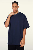 Heavyweight Cotton Relaxed Drop-Shoulder T-Shirt in Navy Blue - front modeled view