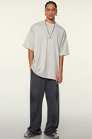 Heavyweight Cotton Relaxed Drop-Shoulder T-Shirt in Oat Gray - full-length front modeled view