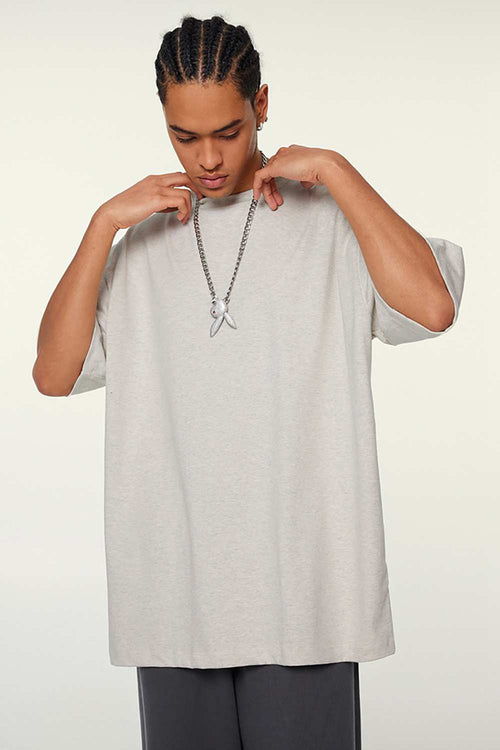 Heavyweight Cotton Relaxed Drop-Shoulder T-Shirt in Oat Gray - front modeled view
