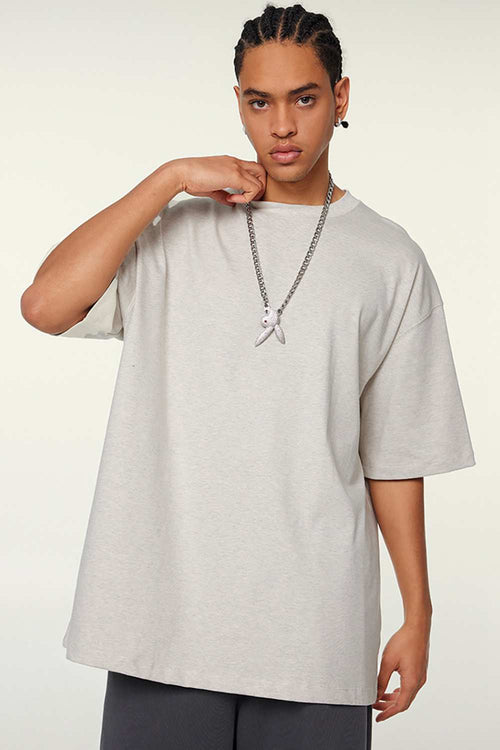 Heavyweight Cotton Relaxed Drop-Shoulder T-Shirt in Oat Gray - front modeled view