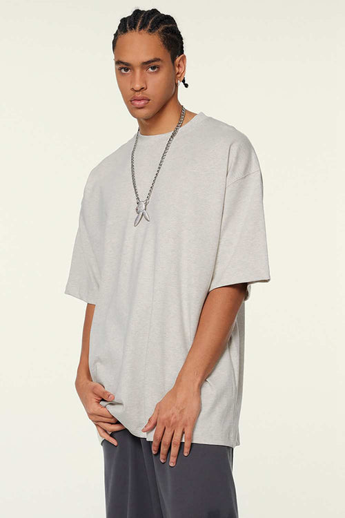 Heavyweight Cotton Relaxed Drop-Shoulder T-Shirt in Oat Gray - front modeled view