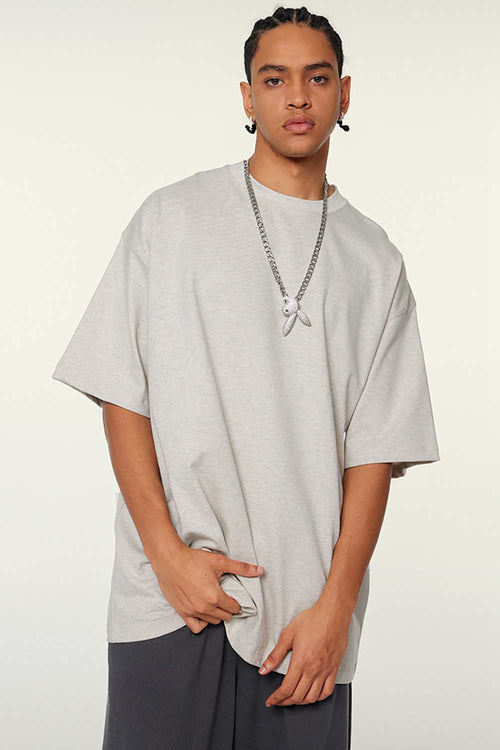 Heavyweight Cotton Relaxed Drop-Shoulder T-Shirt in Oat Gray - front modeled view