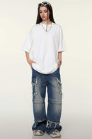 Heavyweight Cotton Relaxed Drop-Shoulder T-Shirt in White - full-length front modeled view
