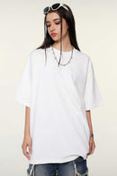 Heavyweight Cotton Relaxed Drop-Shoulder T-Shirt in White - front modeled view