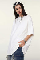 Heavyweight Cotton Relaxed Drop-Shoulder T-Shirt in White - front modeled view