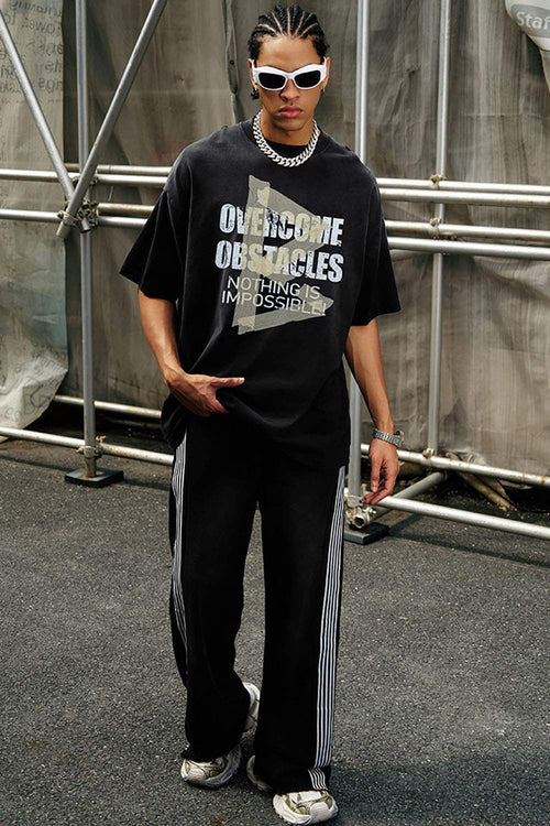 Washed Distressed-Lettering Boxy Graphic T-Shirt in Black - full-length front modeled view