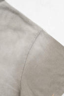 Washed Distressed-Lettering Boxy Graphic T-Shirt in Light Gray - cuff detail