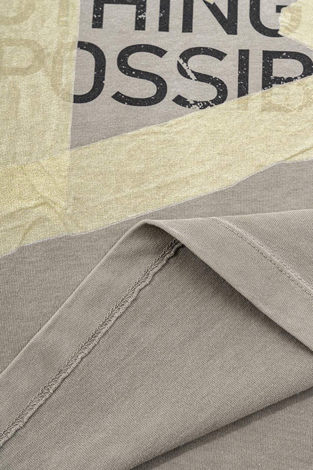 Washed Distressed-Lettering Boxy Graphic T-Shirt in Light Gray - hem detail