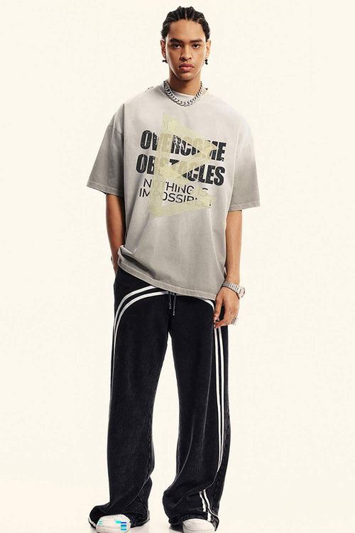 Washed Distressed-Lettering Boxy Graphic T-Shirt in Light Gray - full-length front modeled view