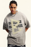 Washed Distressed-Lettering Boxy Graphic T-Shirt in Light Gray - graphic detail