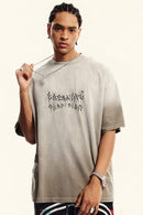 Moisture-Wicking Gradient-Wash Graphic Cotton T-Shirt in Sand - three-quarter front modeled view