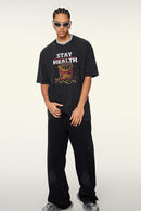 Durable Cotton Graphic T-Shirt in Fried Snowflakes - full-length front modeled view