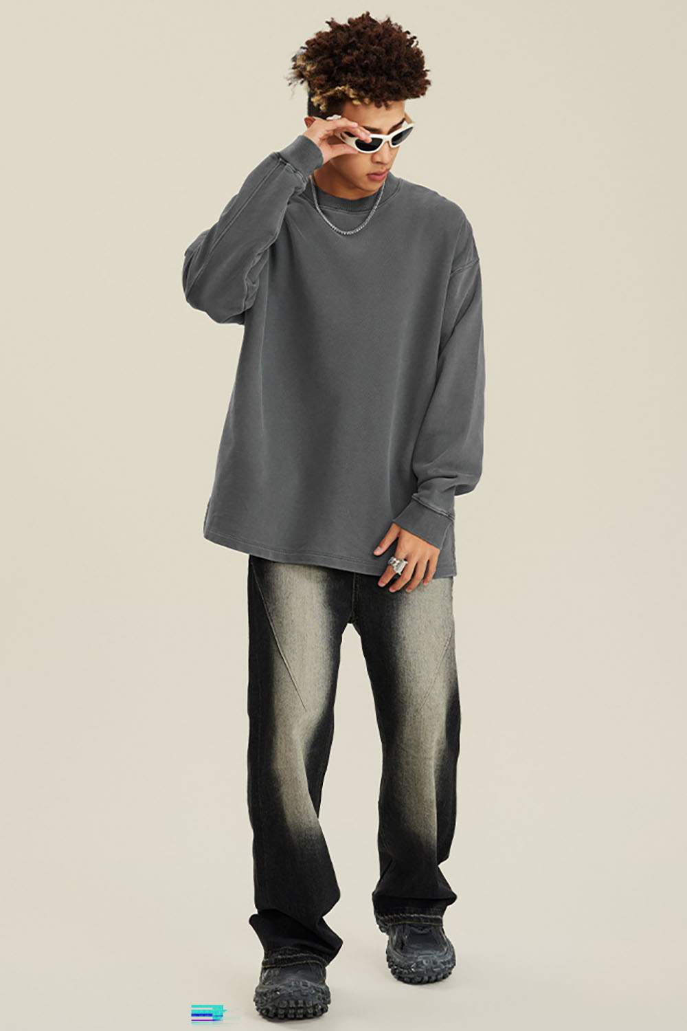 Washed Distressed Panel-Seam Flare Jeans in Black - full-length front modeled view