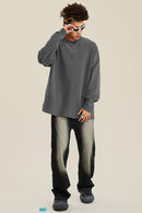 Washed Distressed Panel-Seam Flare Jeans in Black - full-length front modeled view