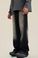 Washed Distressed Panel-Seam Flare Jeans in Black - three-quarter front modeled view