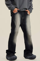 Washed Distressed Panel-Seam Flare Jeans in Black - front modeled view