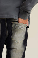 Washed Distressed Panel-Seam Flare Jeans in Black - product detail close-up