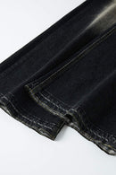 Washed Distressed Panel-Seam Flare Jeans in Black - back pocket detail