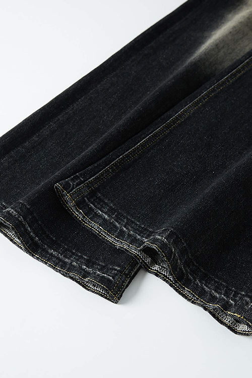 Washed Distressed Panel-Seam Flare Jeans in Black - back pocket detail