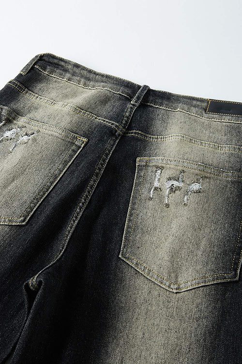 Washed Distressed Panel-Seam Flare Jeans in Black - back pocket detail