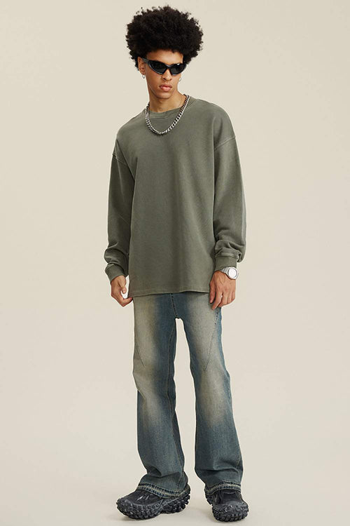 Washed Distressed Panel-Seam Flare Jeans in Denim Blue - full-length front modeled view