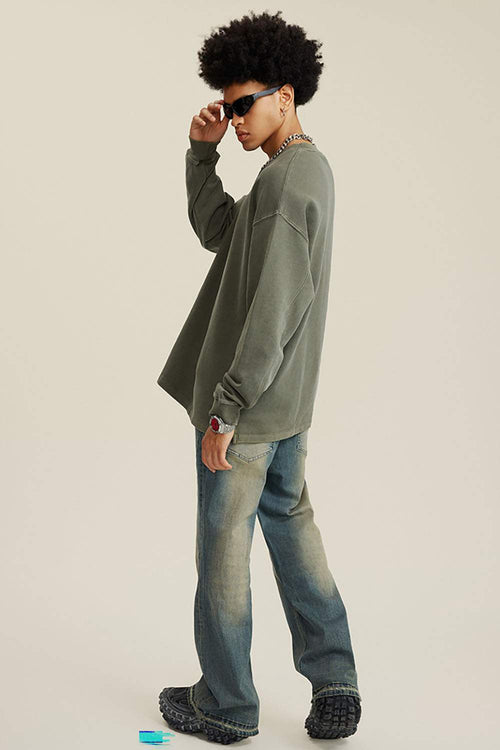 Washed Distressed Panel-Seam Flare Jeans in Denim Blue - side modeled view