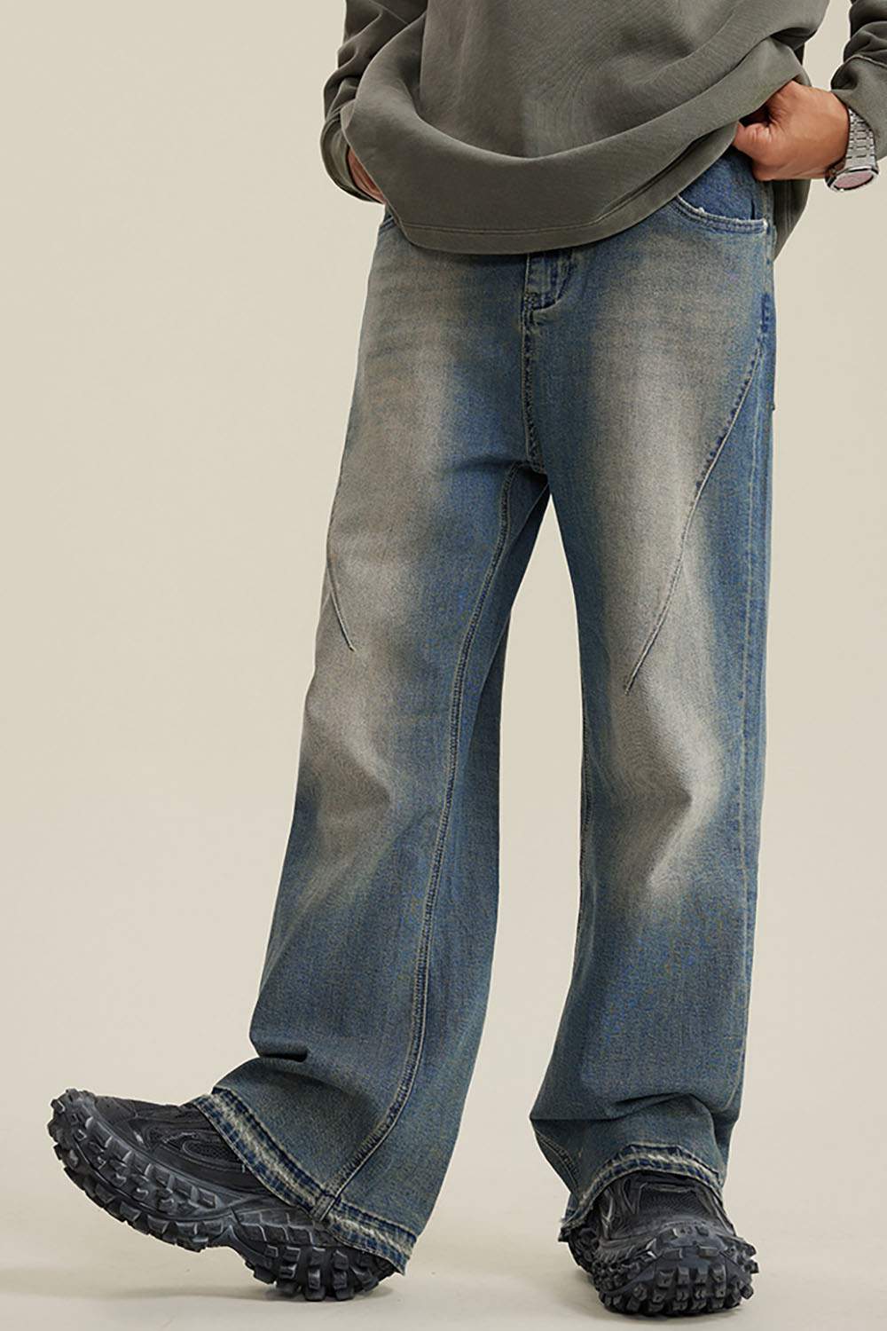 Washed Distressed Panel-Seam Flare Jeans in Denim Blue - front modeled view