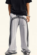 Washed Side-Stripe Zip-Hem Wide-Leg Sweatpants in Flower Gray - full-length front modeled view