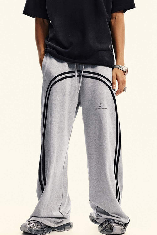 Washed Side-Stripe Zip-Hem Wide-Leg Sweatpants in Flower Gray - full-length front modeled view