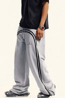 Washed Side-Stripe Zip-Hem Wide-Leg Sweatpants in Flower Gray - three-quarter front modeled view