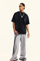 Washed Side-Stripe Zip-Hem Wide-Leg Sweatpants in Flower Gray - full-length front modeled view