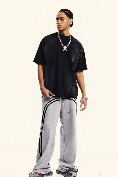 Washed Side-Stripe Zip-Hem Wide-Leg Sweatpants in Flower Gray - full-length front modeled view