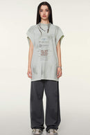 Distressed Brush-Mark Graphic Longline Cotton Tank in Light Gray - full-length front modeled view