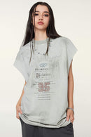 Distressed Brush-Mark Graphic Longline Cotton Tank in Light Gray - front modeled view