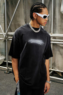 Washed Distressed-Neck Graphic Cotton T-Shirt in Black - front modeled close-up