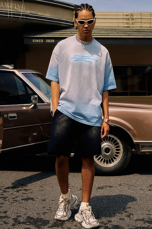 Washed Distressed-Neck Graphic Cotton T-Shirt in Blue - full-length front modeled view