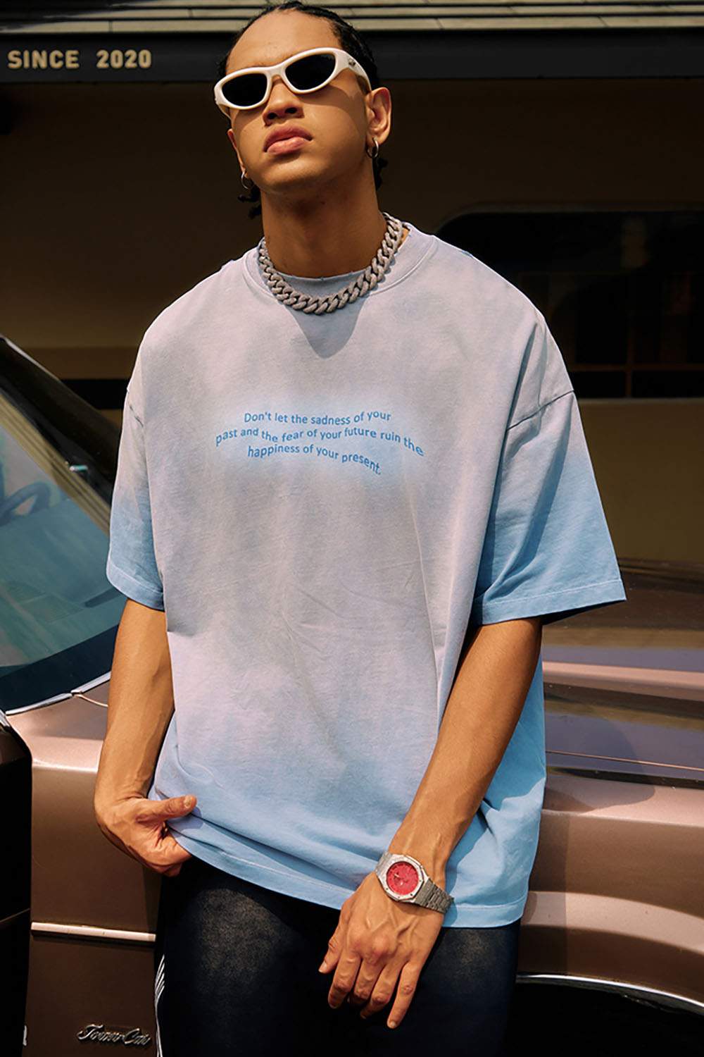 Washed Distressed-Neck Graphic Cotton T-Shirt in Blue - front modeled view