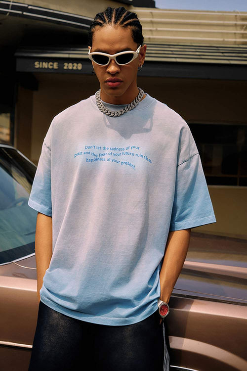 Washed Distressed-Neck Graphic Cotton T-Shirt in Blue - full-length front modeled view