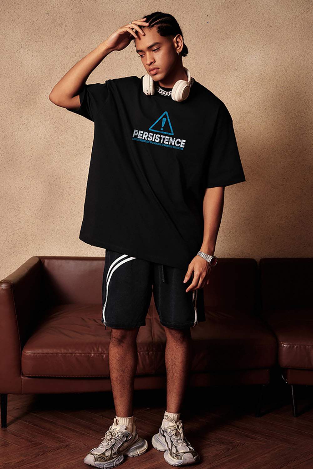 Cool-Touch Persistence Graphic Sorona-Blend T-Shirt in Metallic Black - full-length front modeled view