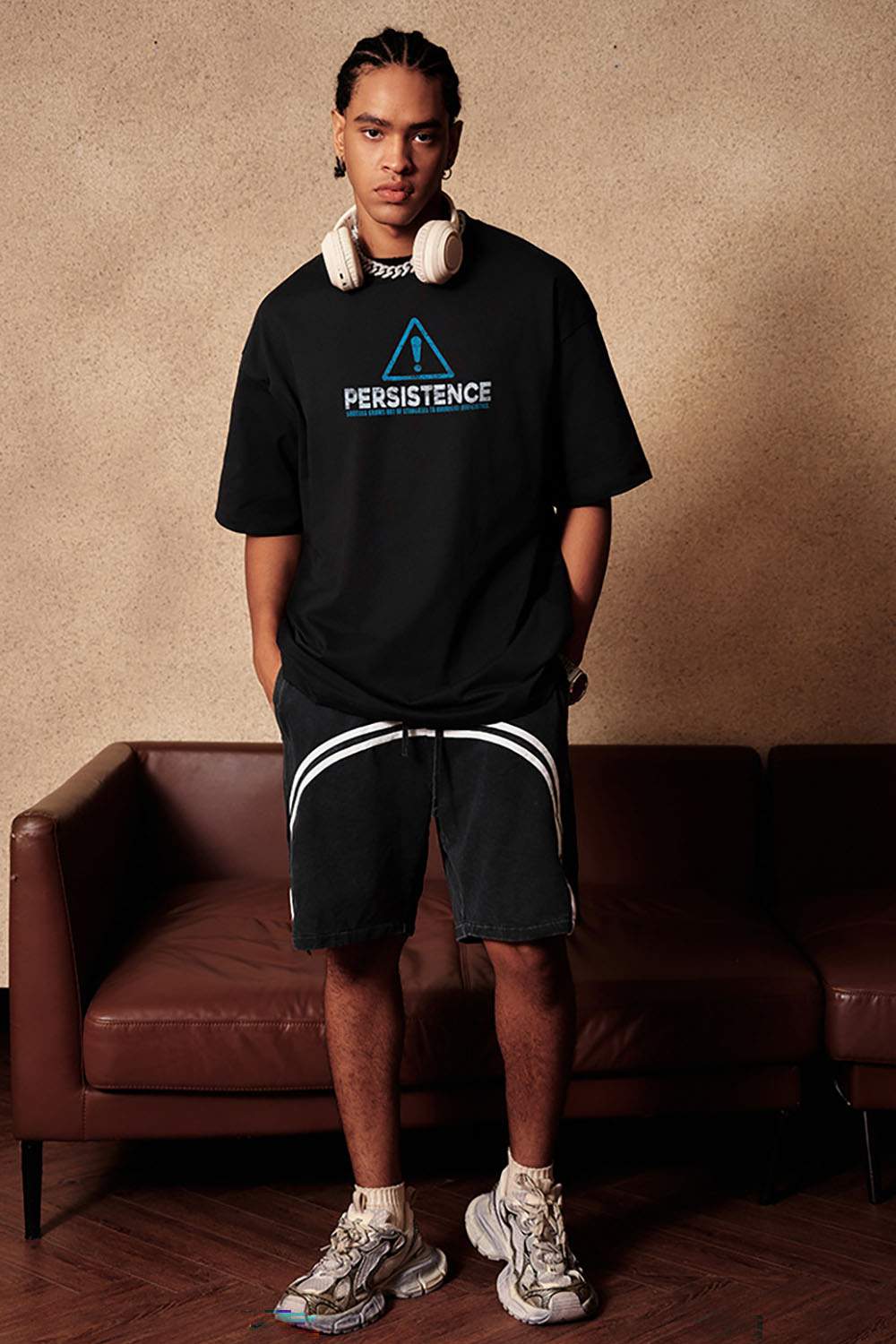 Cool-Touch Persistence Graphic Sorona-Blend T-Shirt in Metallic Black - full-length front modeled view